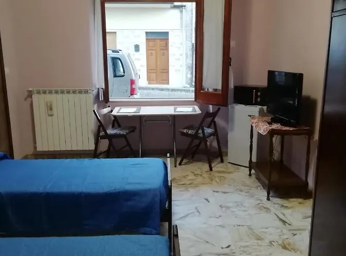 홈스테이 Casa Ai Cappuccini 란다조